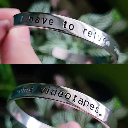 American Psycho "I have to return some videotapes" Cuff Bracelet