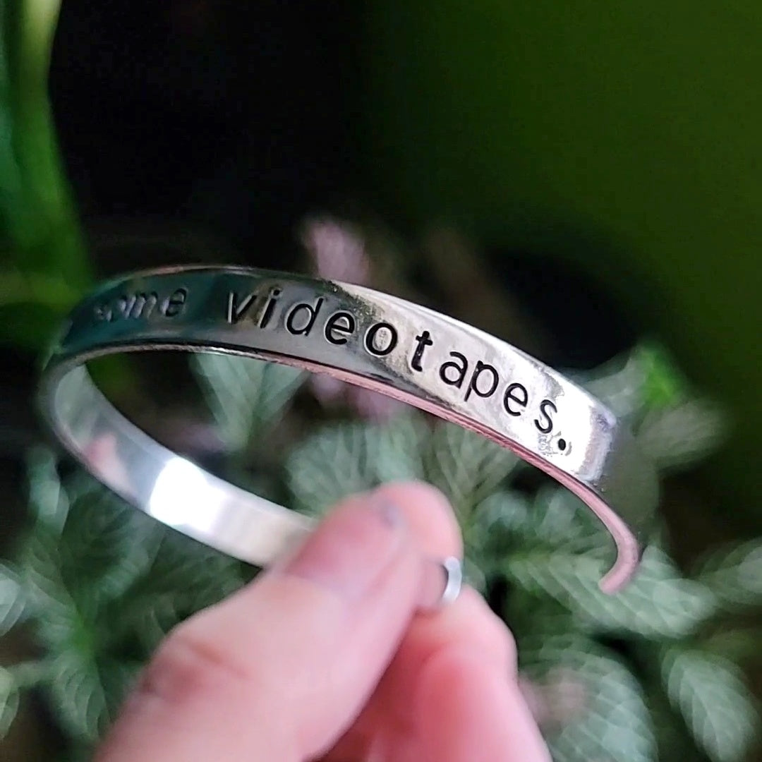 American Psycho "I have to return some videotapes" Cuff Bracelet